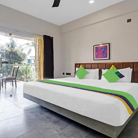 Treebo Grand Vistara Airport Suites Kochi Exterior foto